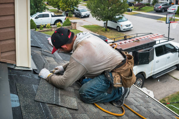 Professional Roofing technician working in Newton Lower Falls, MA